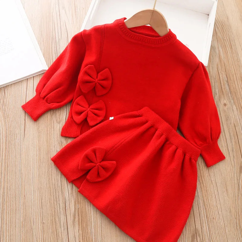 Toddler girls red skirt set with long sleeve top and decorative bows for babies and kids