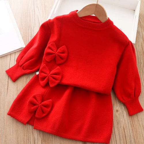 Girls red skirt set with long sleeve top and three bow accents for toddlers