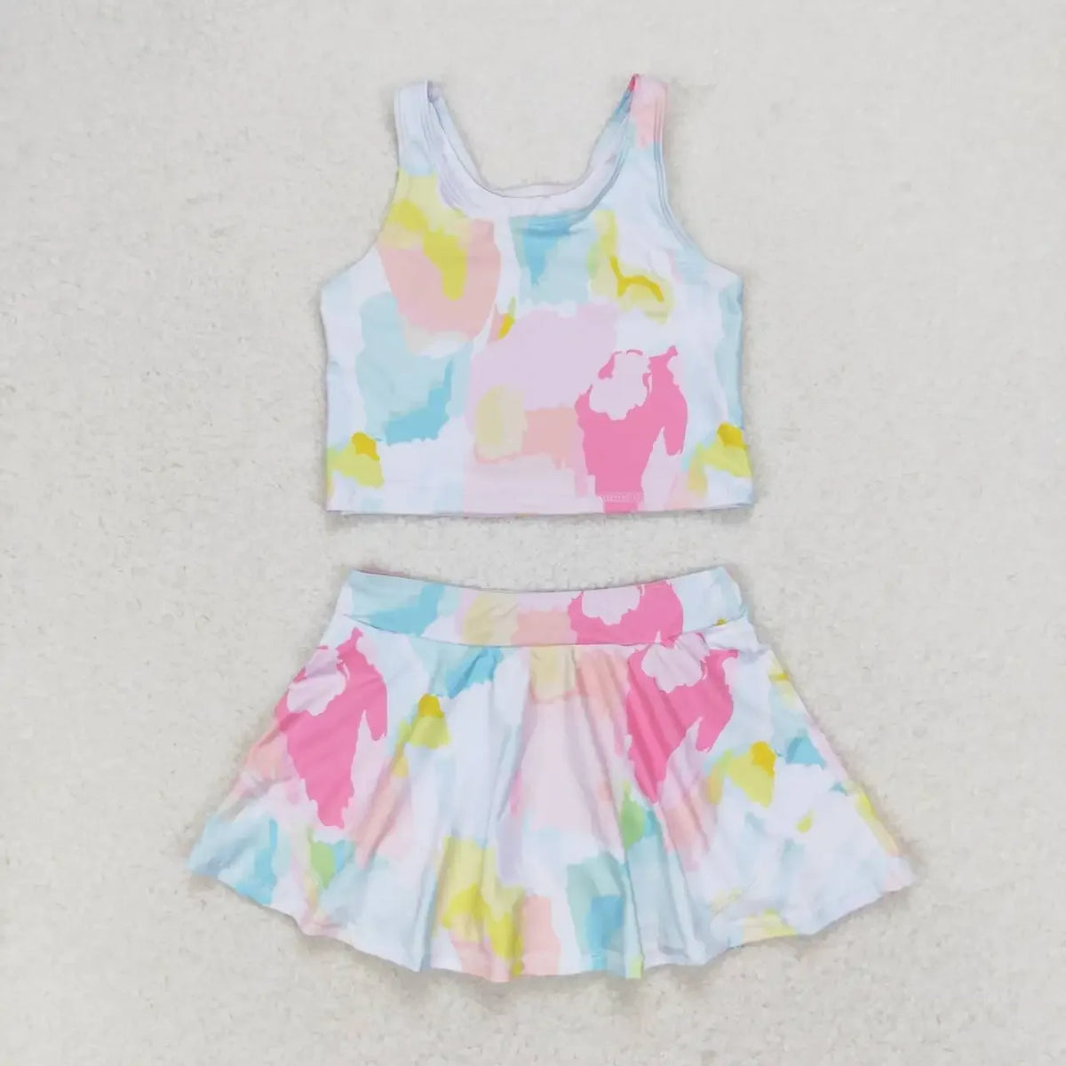 toddler girls pastel multicolor skort outfit with sleeveless crop top and pleated skirt