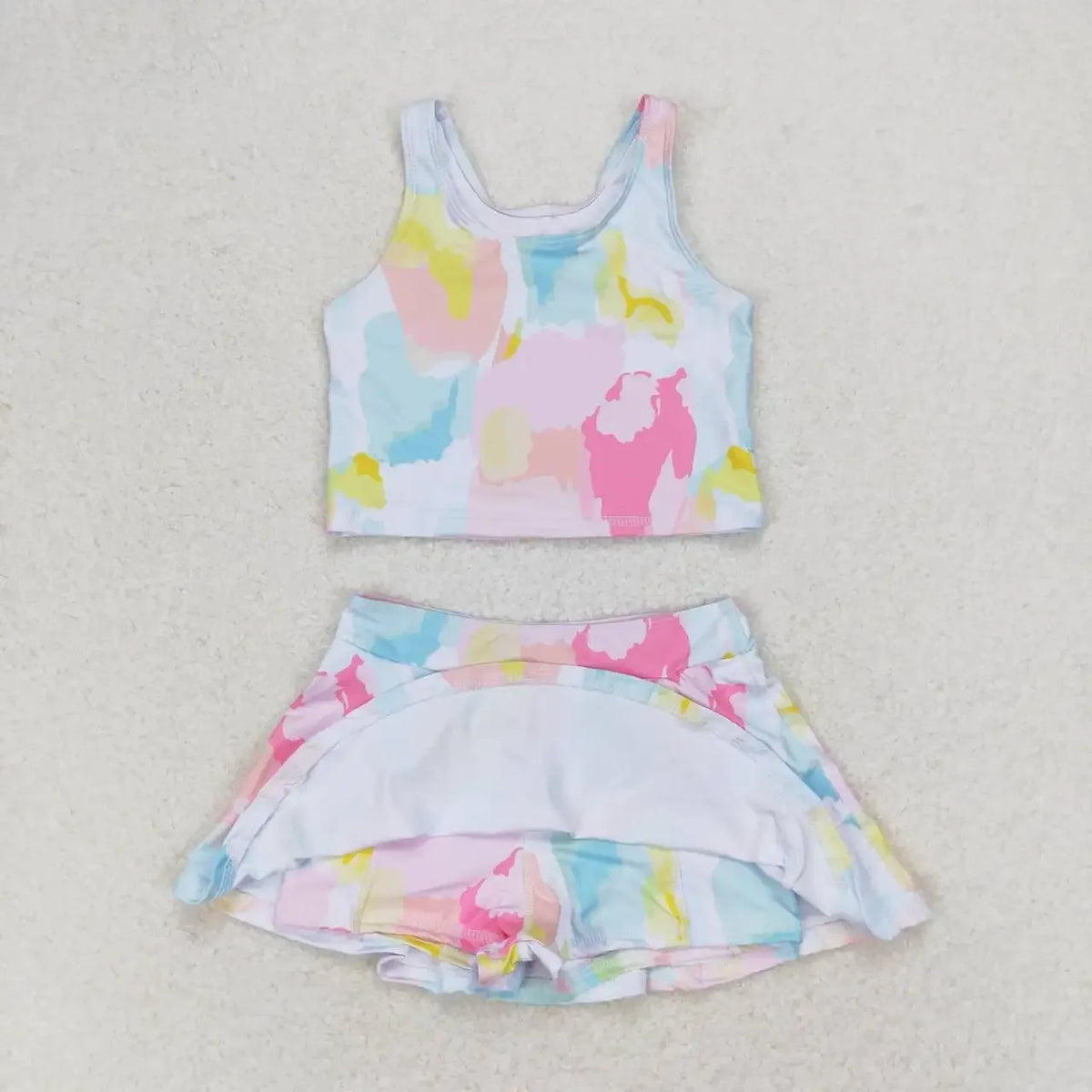 toddler pastel tie-dye skort outfit with sleeveless crop top and flared skort shorts