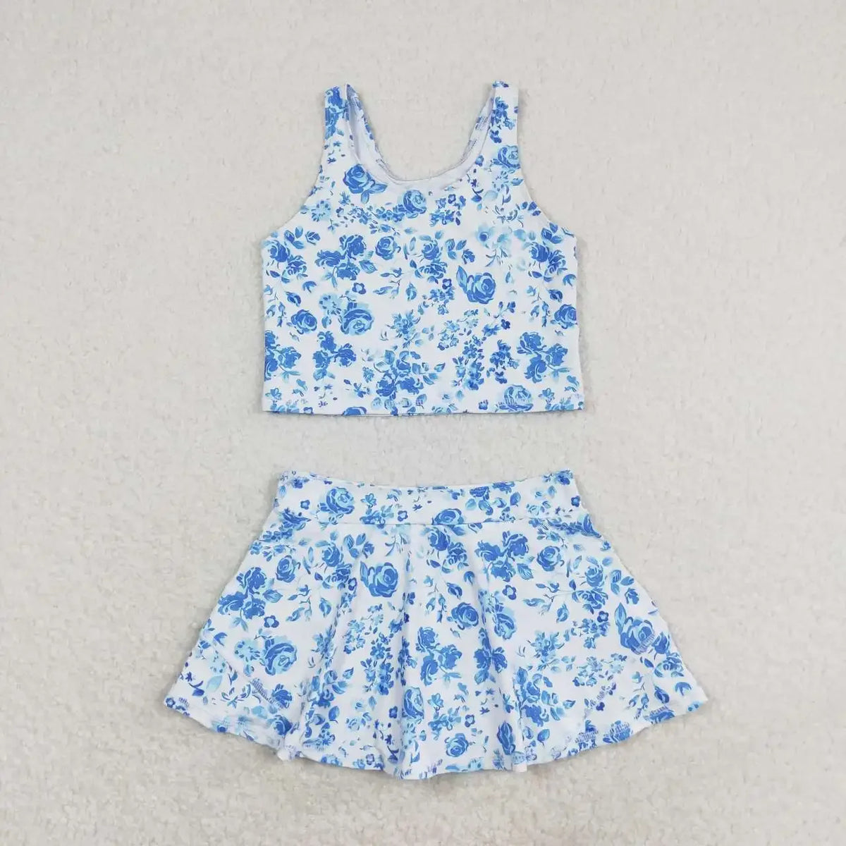 Girls white and blue floral skort outfit with sleeveless crop top for kids