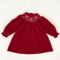 baby girls red smocked dress with long sleeves and white bow embroidery on smocked neckline
