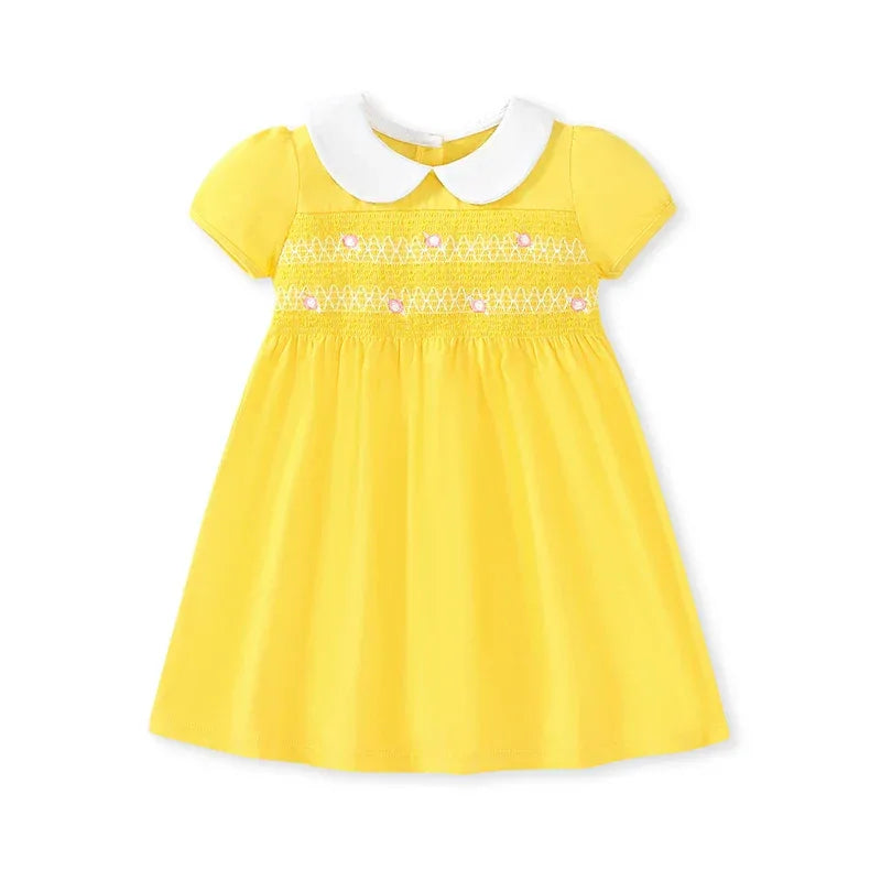 baby yellow smocked dress with white peter pan collar and short sleeves for infants