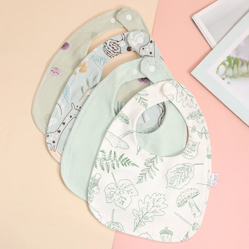 Soft cotton baby bib set with green leafy and animal prints for infants, adjustable snap closure