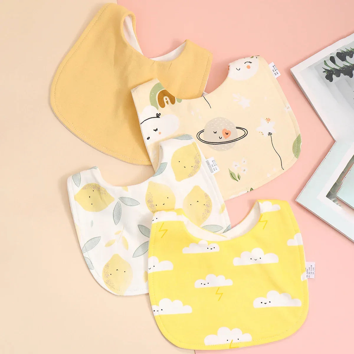 soft cotton baby bib set with yellow cloud, lemon, and animal prints for infants and toddlers