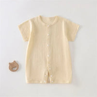 cream soft cotton baby romper for newborns with short sleeves and front snap buttons