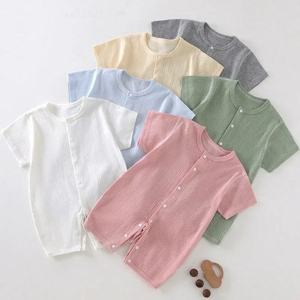 Soft cotton baby romper set in white, pink, blue, green, yellow, and gray for infants with short sleeves and button details