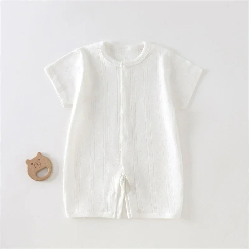 white soft cotton baby romper for infants with short sleeves and front button detail