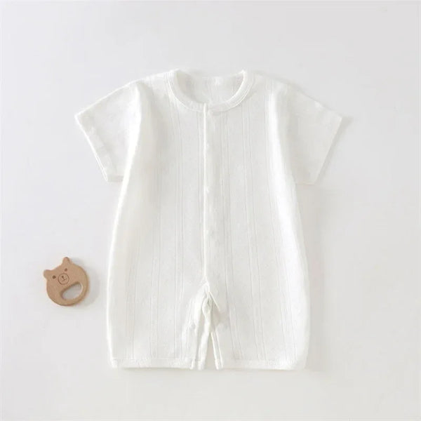 white soft cotton baby romper for infants with short sleeves and front button detail