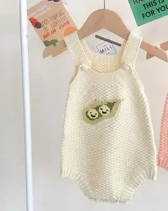Cream soft knit baby romper for infants with cute smiling pea pod design
