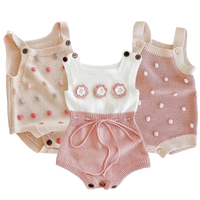 Soft knit baby romper set in cream, pink, and beige for babies with floral and polka dot details