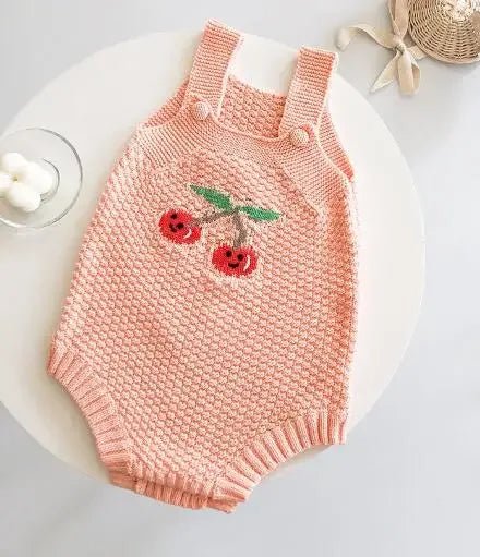 soft knit baby romper in peach pink with cherry design, newborn size sleeveless romper