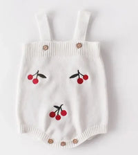 white soft knit baby romper with red cherry pattern, sleeveless for newborns and infants