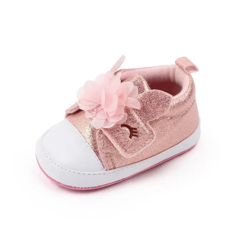 pink soft sole baby shoes with flower decoration designed for infants