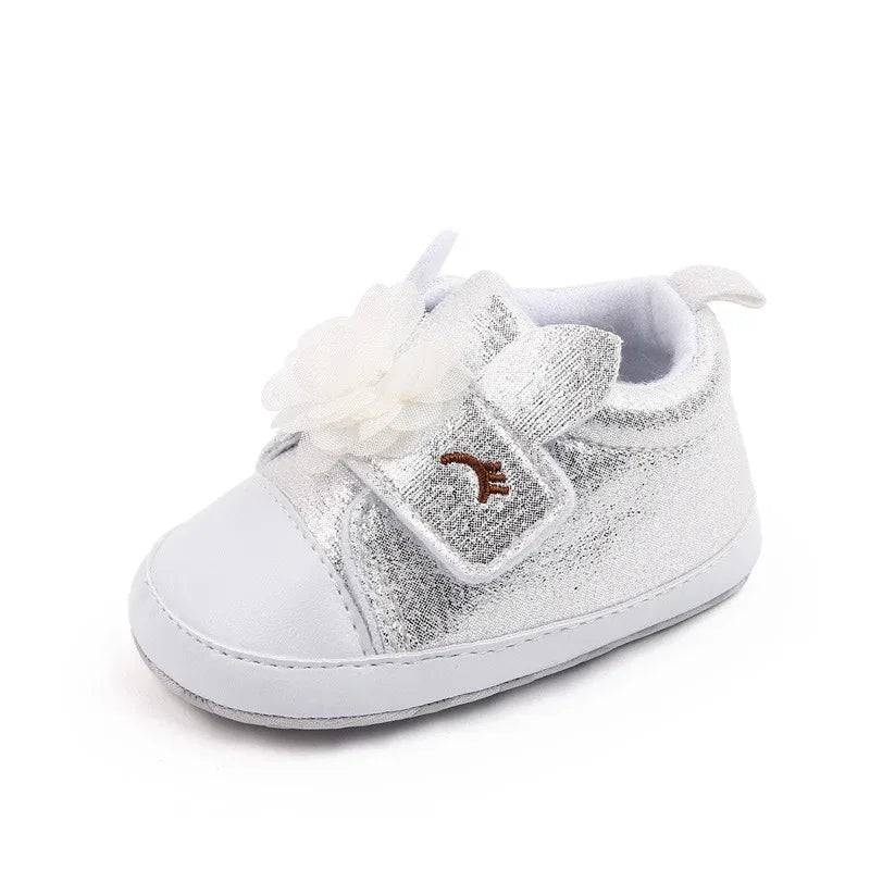 silver and white soft sole baby shoes with flower decoration for infants