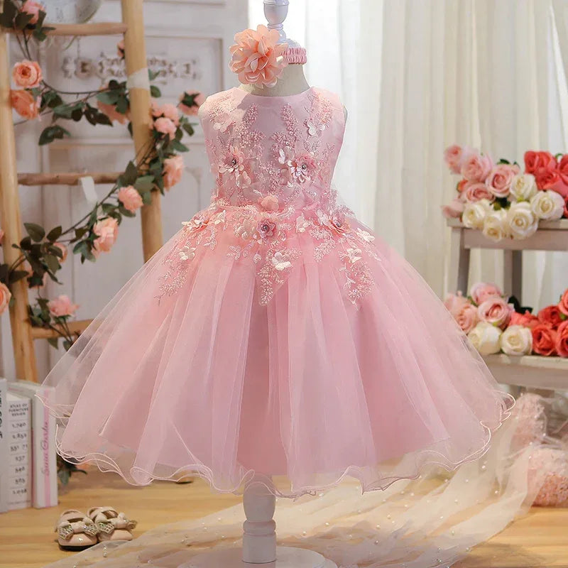 Pink girls special occasion dress with floral embroidery and tulle skirt for toddlers