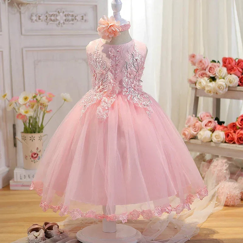 Pink special occasion dress for girls with floral lace bodice and tulle skirt in toddler size