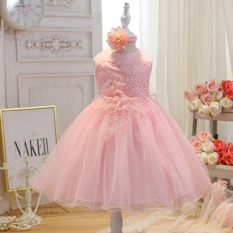 Pink sleeveless special occasion dress for toddlers with floral embroidery and tulle skirt