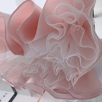 baby pink special occasion dress with ruffled organza layers for infants