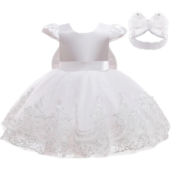 baby white special occasion dress with satin bodice, lace embroidered skirt, and matching headband