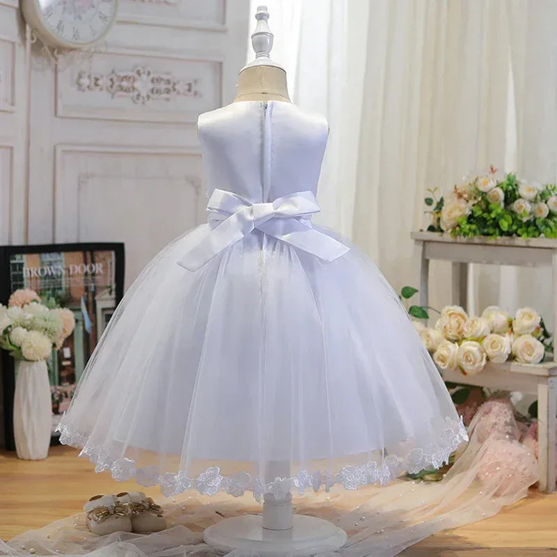 White sleeveless girls special occasion dress with satin bow and tulle skirt for babies and kids