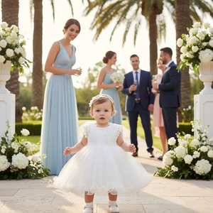 white baby special occasion dress with floral lace cap sleeves and ruffled tulle skirt