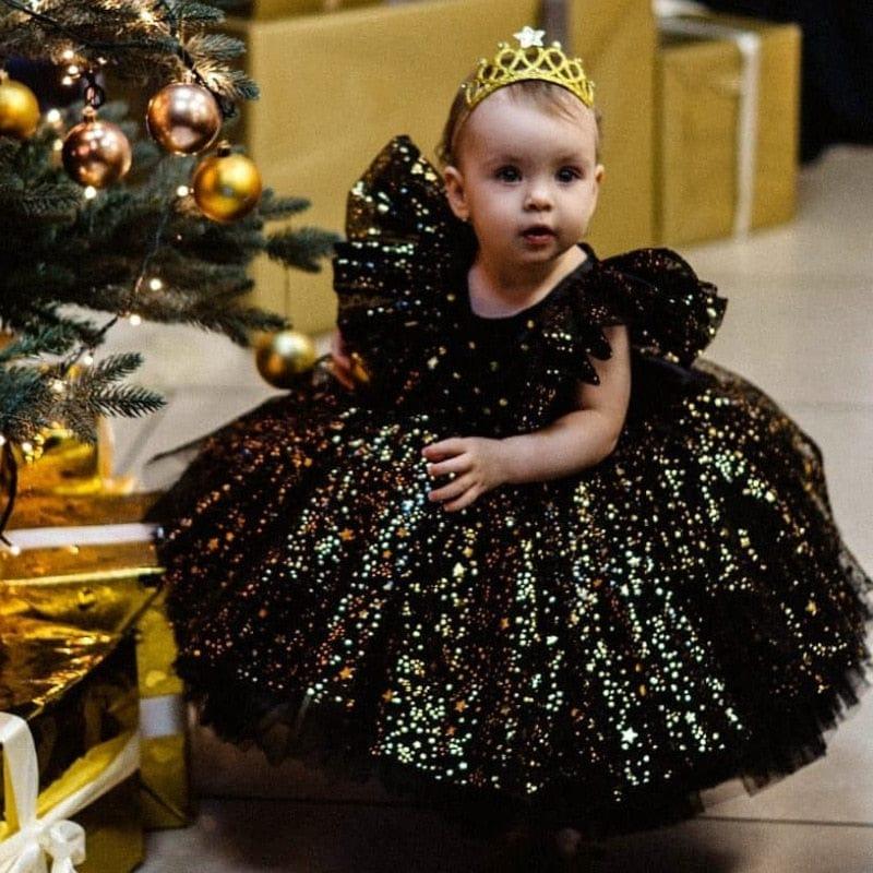 Girls black special occasion dress with lace and sequin details, toddler size with ruffled sleeves