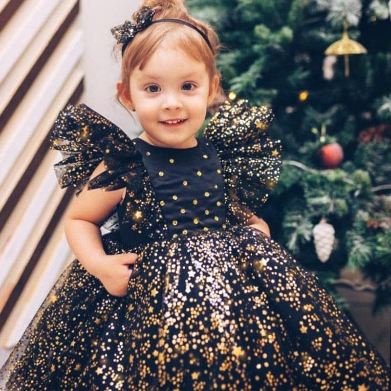 Girls black and gold special occasion dress with lace and puff sleeves for toddlers