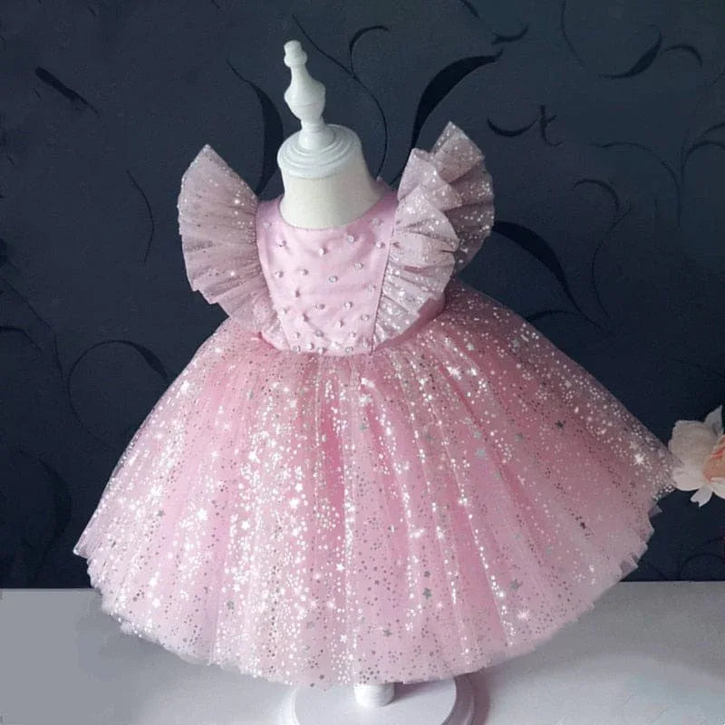 Girls pink special occasion dress with lace and starry tulle, toddler size with ruffled sleeves