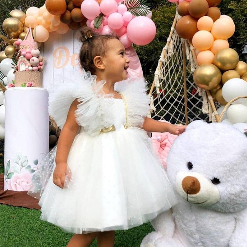 White special occasion dress with lace for girls toddler size with ruffle sleeves and tulle skirt