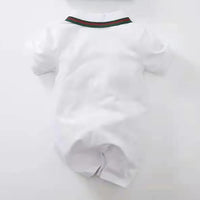 White sporty baby summer romper with short sleeves and green red striped collar for infants