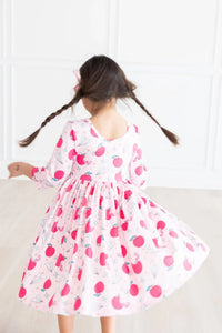 Girls white and pink star student twirl dress for girls with 3/4 sleeves and playful apple print