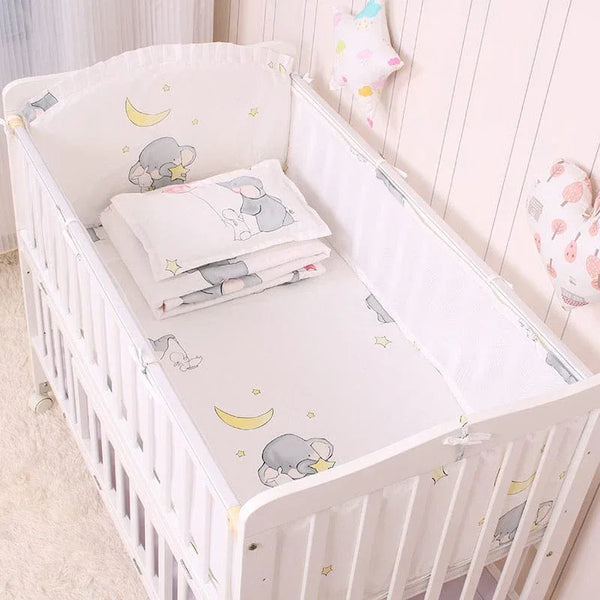 Starry elephant baby crib bedding set in white with gray elephants and yellow moons for infants