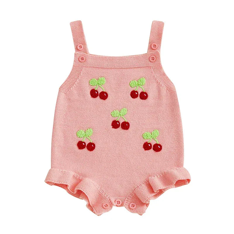 pink strawberry baby romper for girls with embroidered cherries and ruffled leg openings newborn size