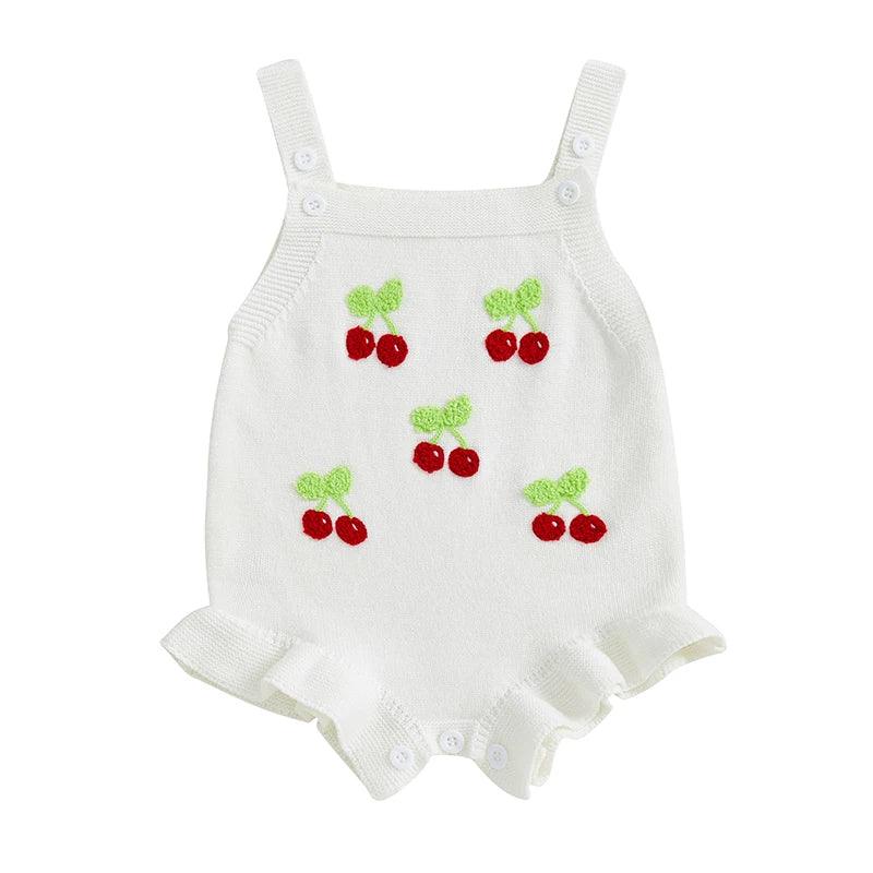 white baby romper for girls with red cherry embroidery and button straps for infants