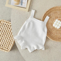 white baby romper for girls with ruffle trim, sleeveless, newborn to toddler size
