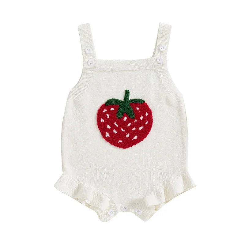 white sleeveless strawberry baby romper for girls with ruffle trim and red strawberry detail