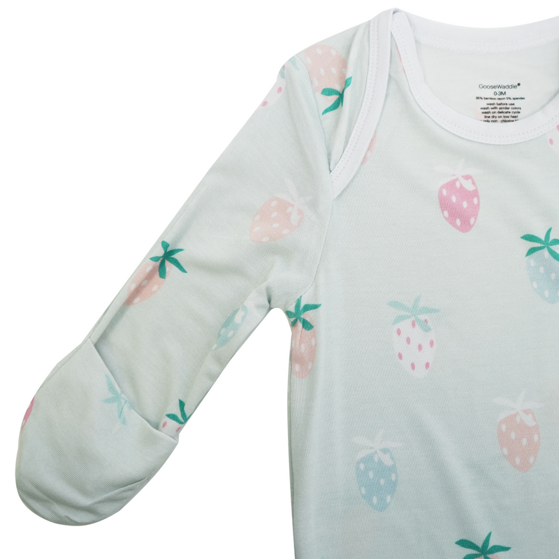 Close-up of the sleeve of the Strawberry Print Knotted Gown, showcasing its soft fabric and charming strawberry pattern, perfect for 0-3 month old babies.