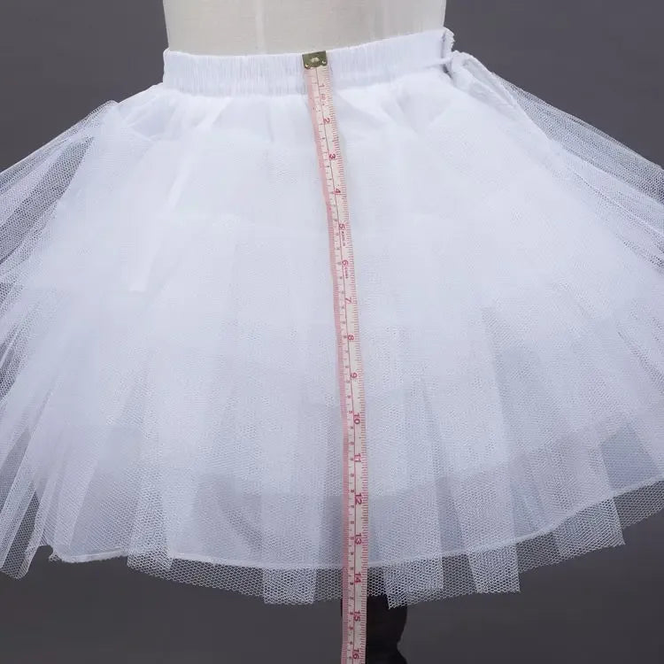 white tulle girls skirt for babies and kids with elastic waistband and layered design