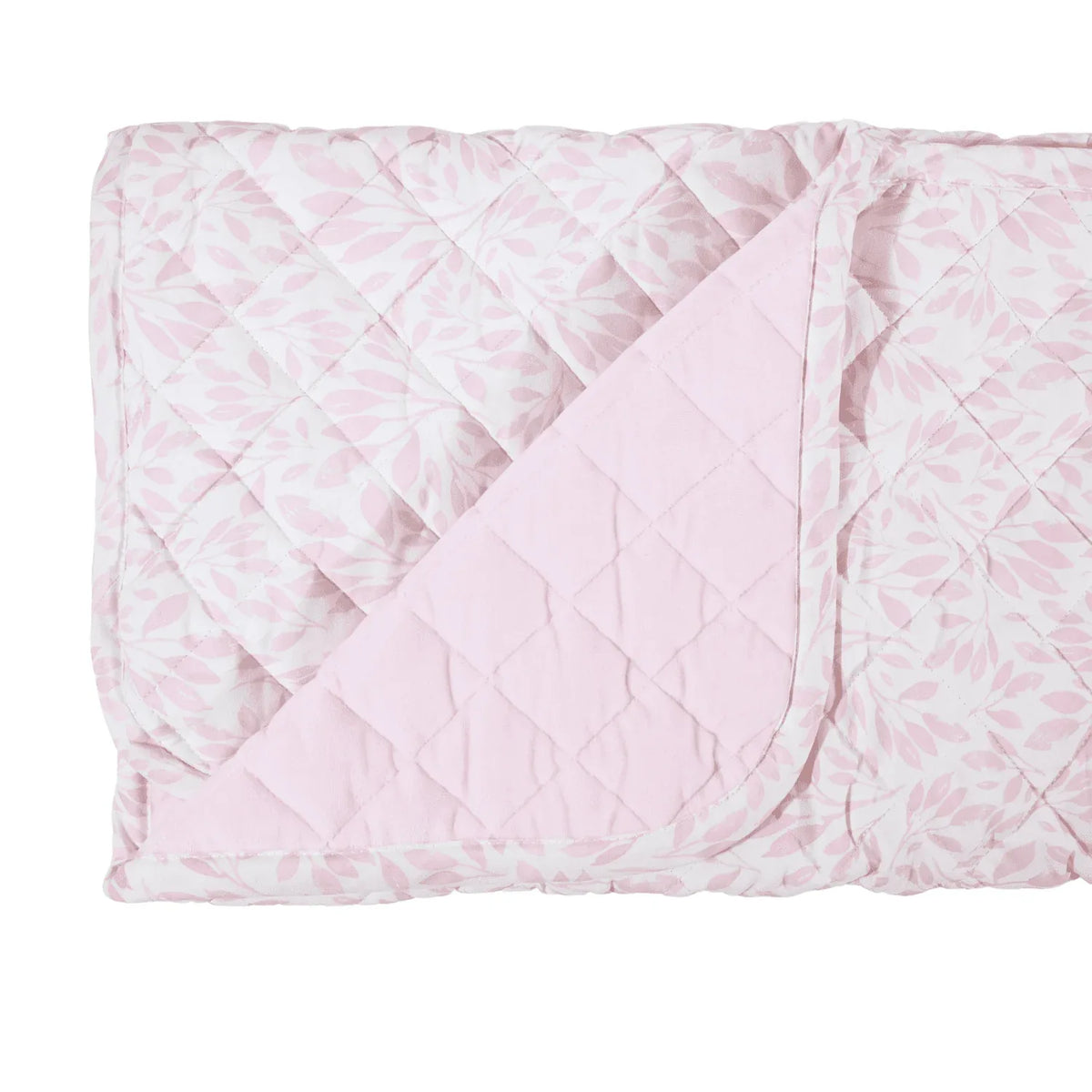 Pink and white quilted super soft baby play mat with leaf pattern folded at corner