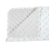 super soft baby play mat with gray quilted interior and white star-patterned border for newborns