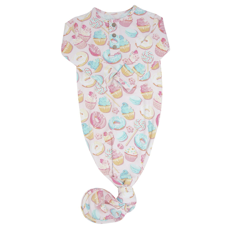 Baby onesie with colorful dessert pattern on a white background