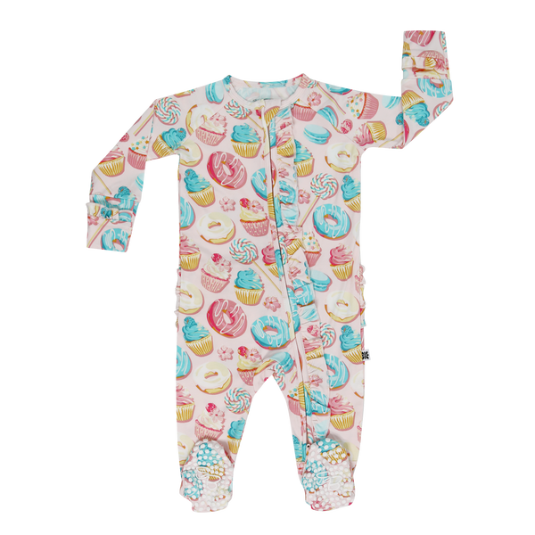 Sweet Tooth Ruffle Footie in pastel candy print with 2-way zipper, bottom ruffles, and hypoallergenic silky fabric.