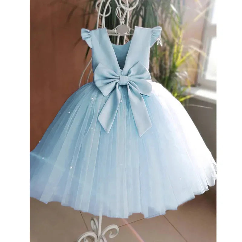 baby blue tulle party dress for toddlers with large front bow and sleeveless design
