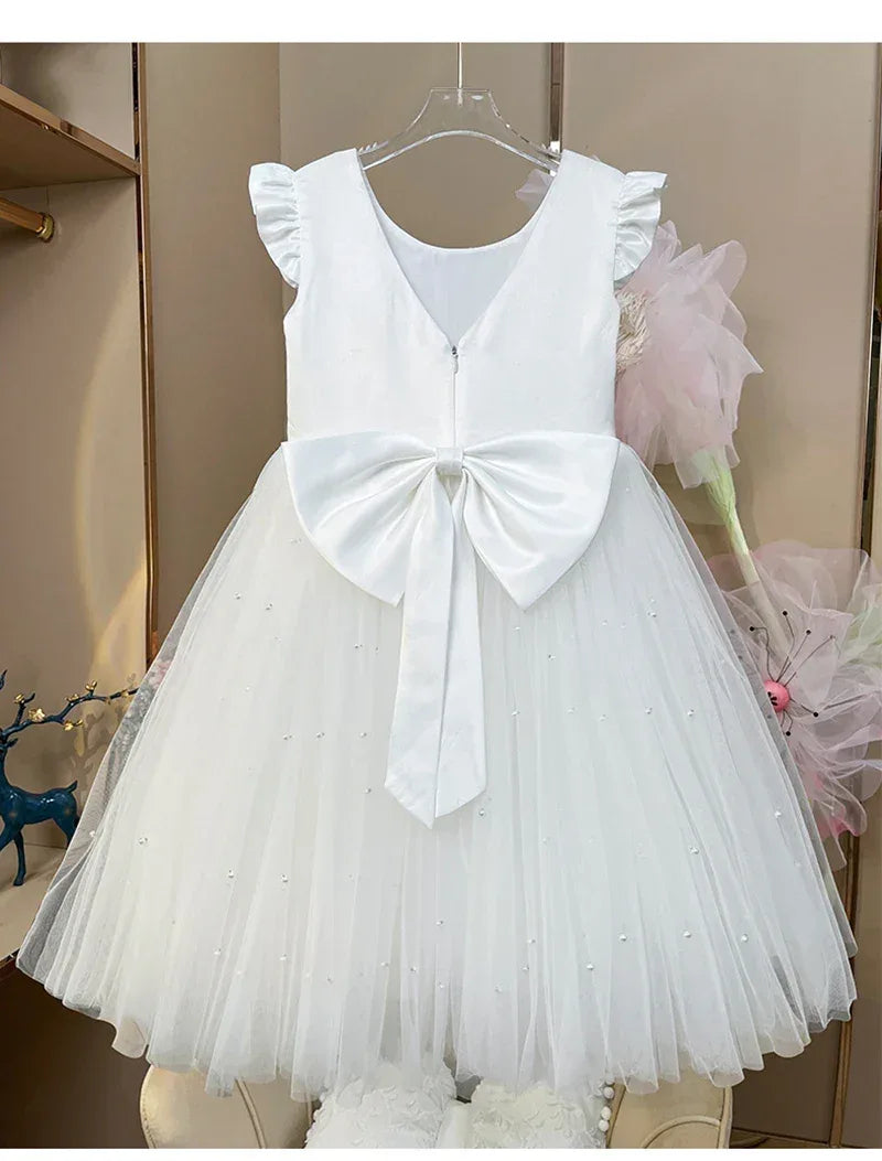 White baby tulle party dress with big bow back and pearl details size 12-18 months