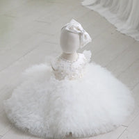 White tulle special occasion dress for girls with floral beadwork and large matching bow headband