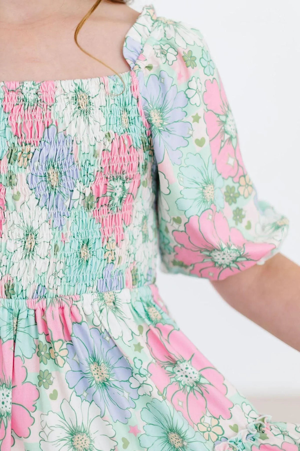 Girls pastel floral smocked ruffle twirl dress for girls with puff sleeves by Mila and Rose