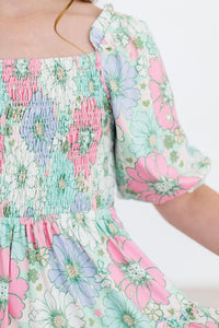 Girls pastel floral smocked ruffle twirl dress for girls with puff sleeves by Mila and Rose