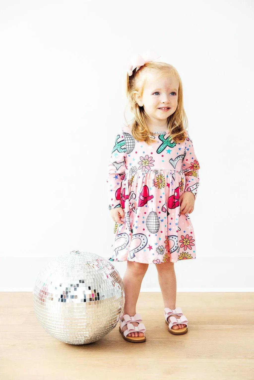 Toddler girls pink long sleeve twirl dress with colorful butterfly and flower print pocket