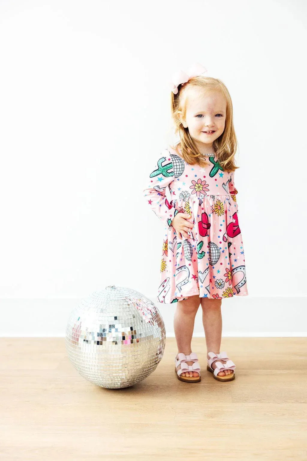 Toddler girls pink twirl dress with cactus and floral print long sleeve and pocket